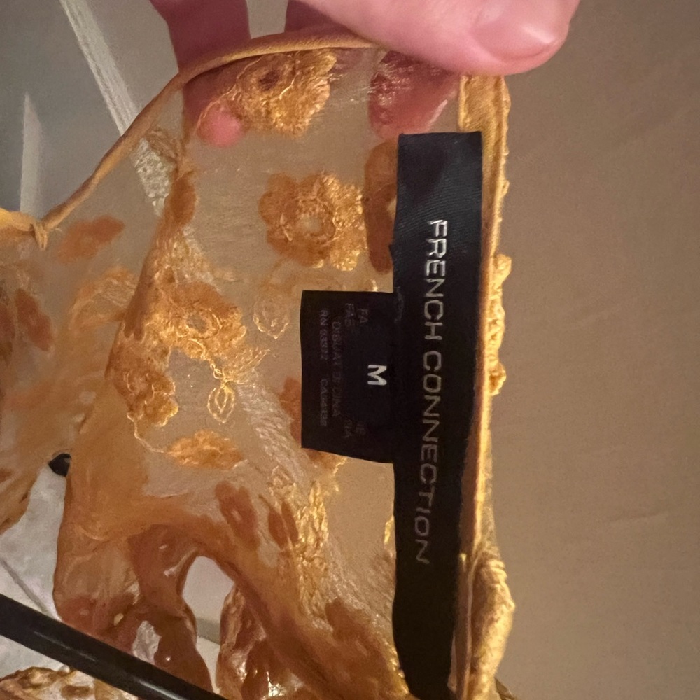 French connection yellow flower top. Very cute with a yellow tank